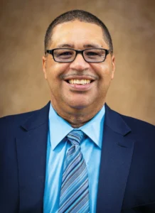 A headshot of Doctor Gregory Goins